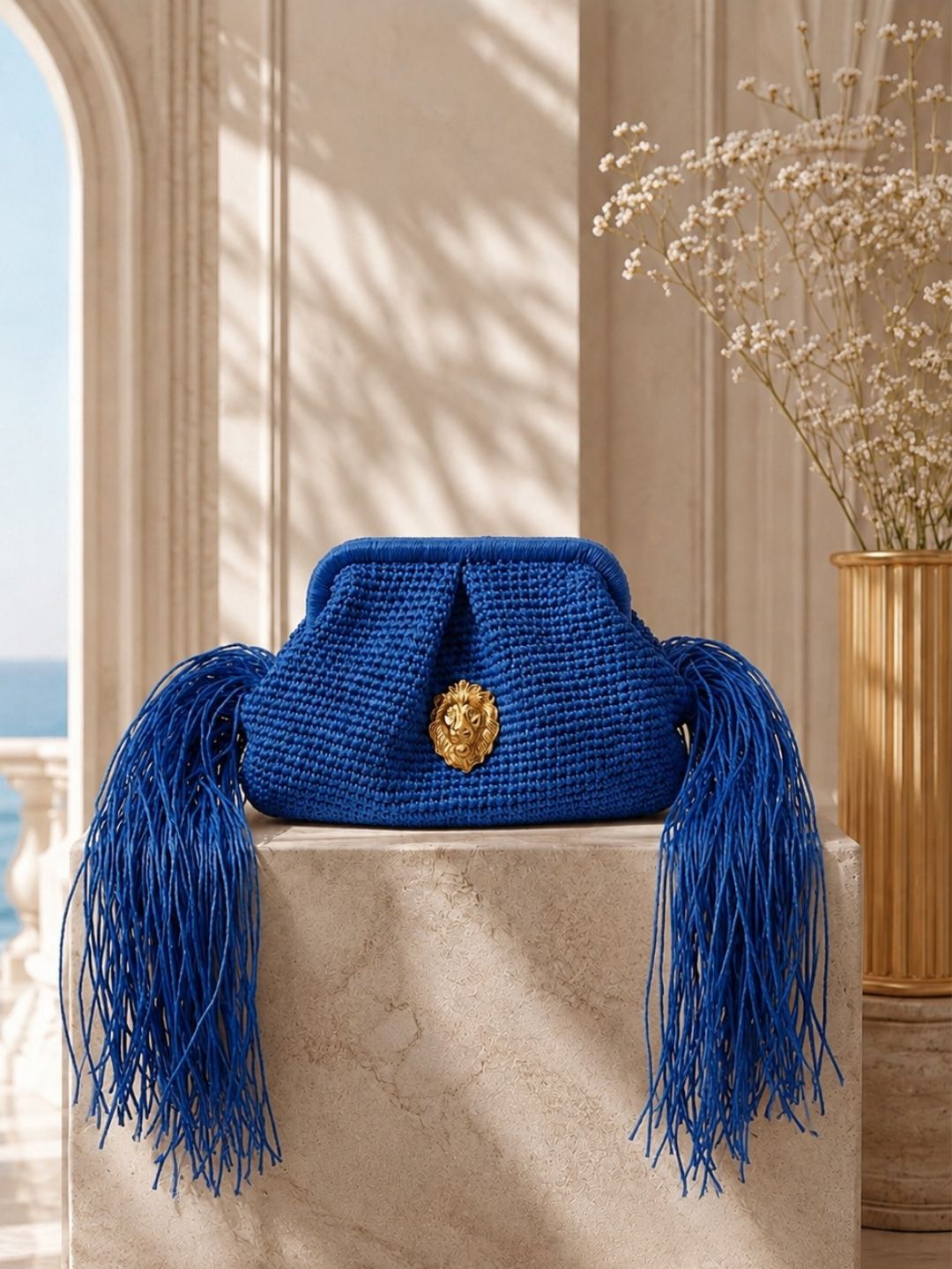 The Kimo Fringe Clutch