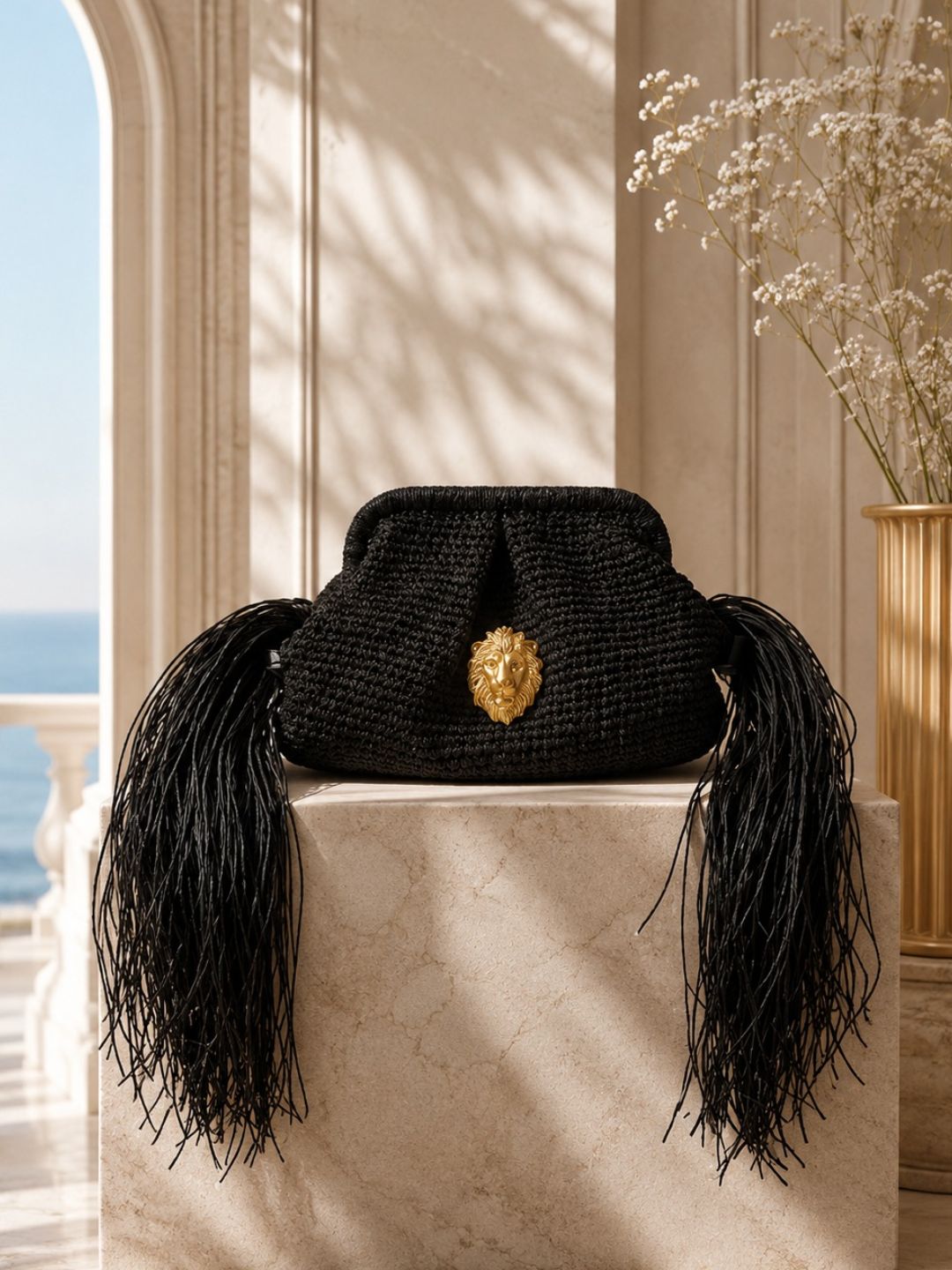 The Kimo Fringe Clutch